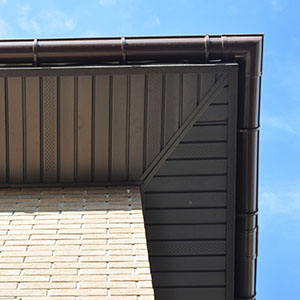 Roofs Fast Soffit & Fascia Services - click to view soffit and fascia services; view of soffit on a house