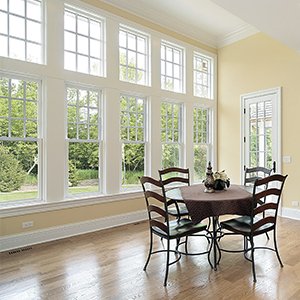 Roofs Fast Window Services - click to view window services, styles and colors - dining room with wall covered with windows